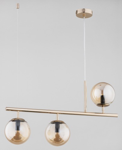 nowoczesny-zyrandol-zlote-kule.jpg